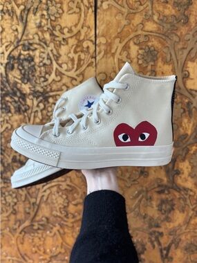 Brand new CDG NWT Converse High Top Sneakers in Cream with Red Heart